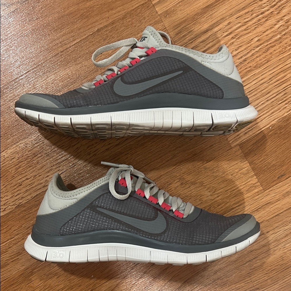 Nike Gray Running Sneakers with Pink Eyelet Accents